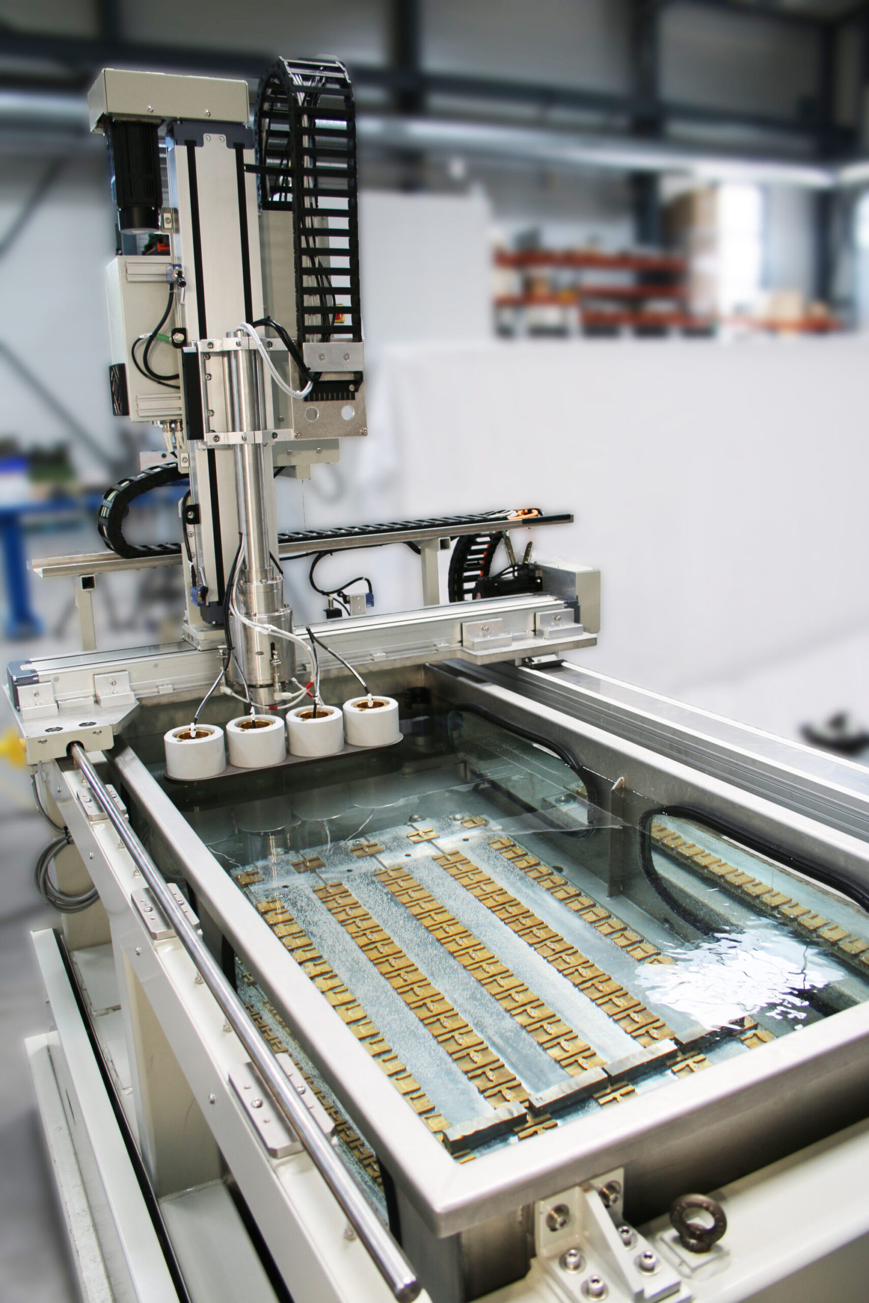 Immersion tank configuration for steel parts inspection